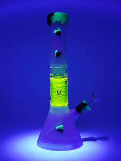 Stratus Silicone Bee Clear Freezable Perc with glowing accents under blue light for home or travel use