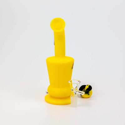 Honeybee Herb silicone bong travel kit with honeycomb design, 14mm Female rig, quartz nail, glass flower bowl, and metal dab tool.