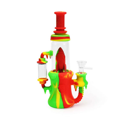 Ritual 8.5'' Silicone Rocket Recycler - Rasta with rocket ship perc in vibrant red, yellow, and green colors.